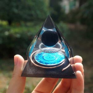 Orgonite pyramid with black obsidian sphere