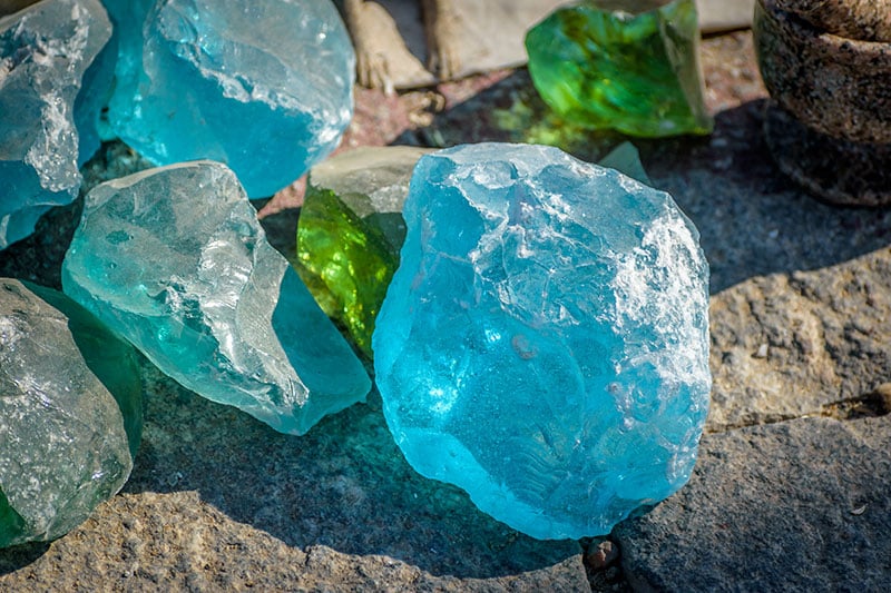 Aquamarine raw crystal specimens.